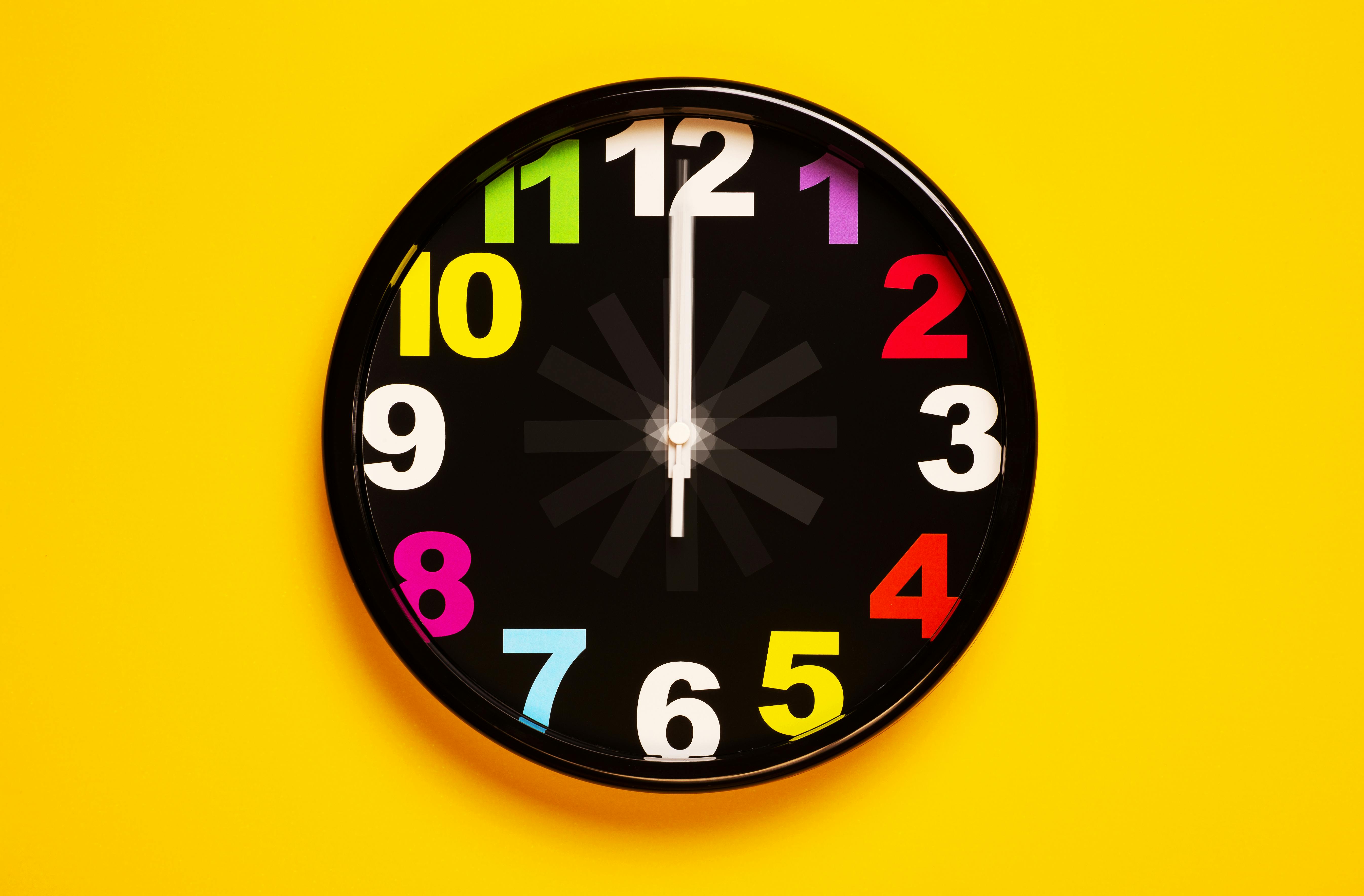 Stylish wall clock in modern room